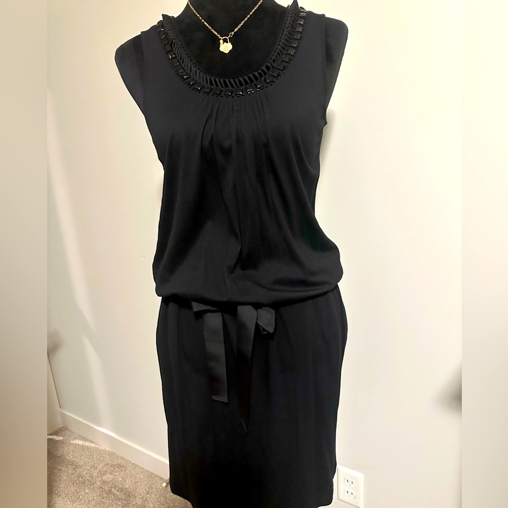 Women’s black tank top dress with pockets from the loft store size medium.